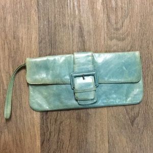 5x10 clutch with wrist strap. Fits 6 credit cards